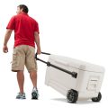 man pulling a cooler with wheels and handles