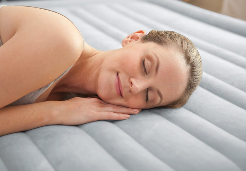 Lady asleep on an air mattress