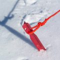 MSR aluminum tent stake in the snow
